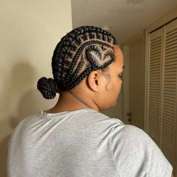 Low Bun Lemonade Braids with Heart Hair - A woman wearing a grey shirt