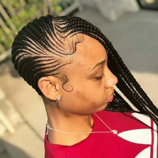 Neat Small Lemonade Braid Hairstyle - A woman wearing a red shirt