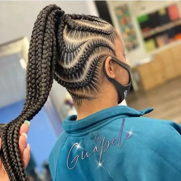 Ponytail Lemonade Braids - A woman wearing a jacket