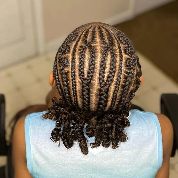 Slayed cornrows braided hairstyle with weave - defined braid pattern with curly weave ends