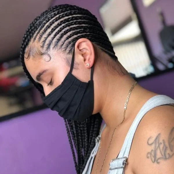 Small Lemonade Braided Hair - A woman wearing a black mask