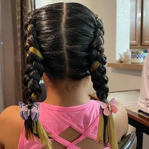 Two Reverse Braids with Butterfly - a woman wearing a sexy back top in pink.