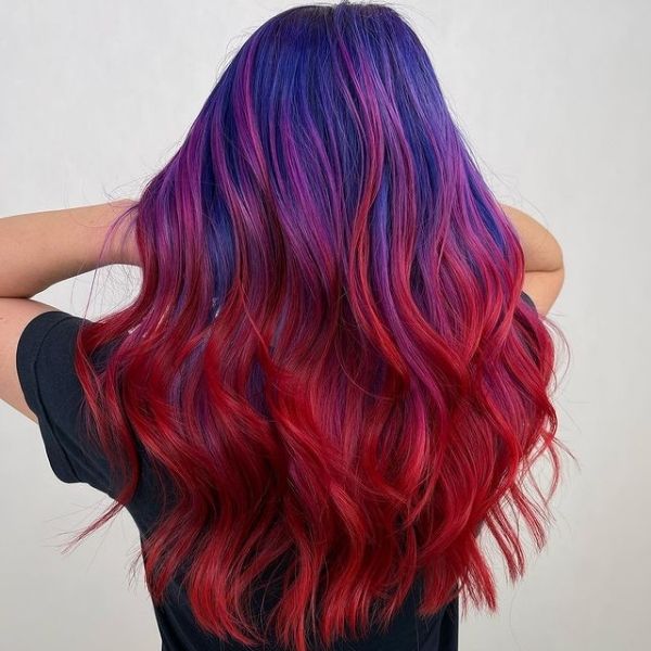 Violet Blue Color Melt Sunset - A woman facing a wall