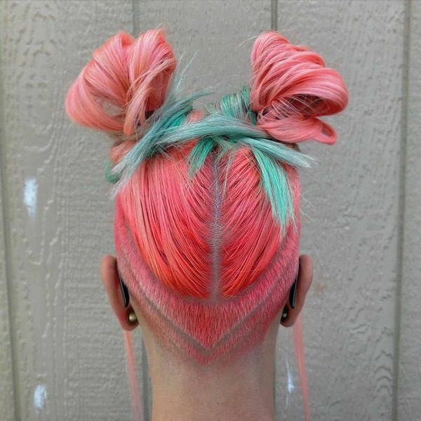 Watermelon Funky Hair Undercut - A woman facing a wooden wall