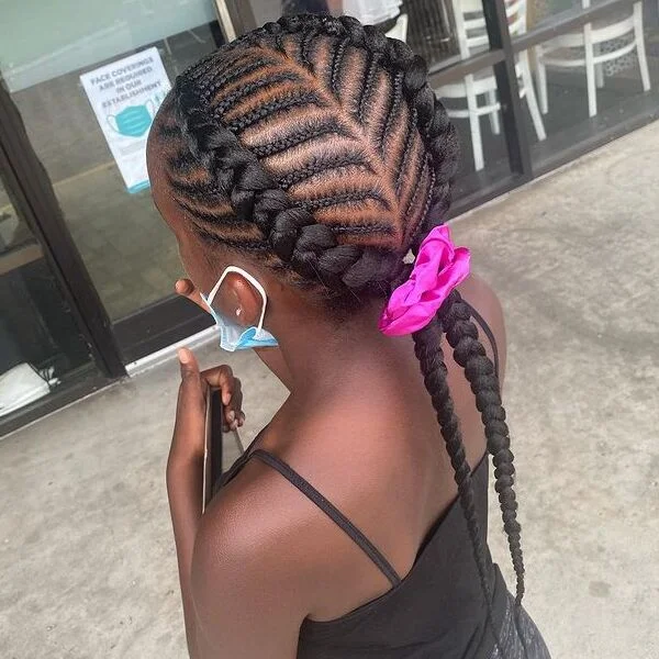 2-strand Fishbone Braid in Ponytail - a woman wearing black tank top.