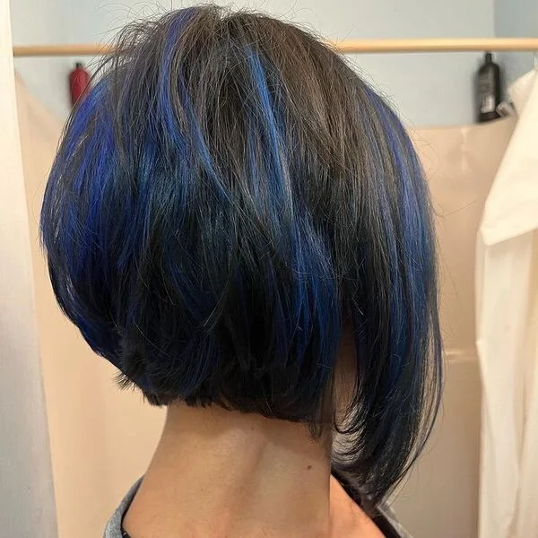 Asymmetric Midnight Blue Bob - a woman wearing gray shirt.