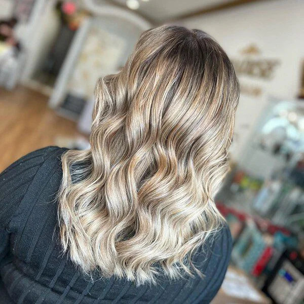 a woman wearing black sweater.