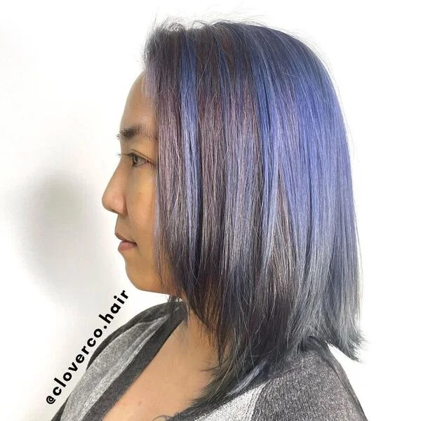 Blue and Ash Highlighted Lob - a woman wearing gray sweater.