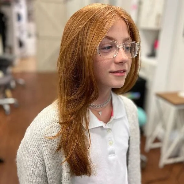 a woman wearing white polo shirt with cardigan