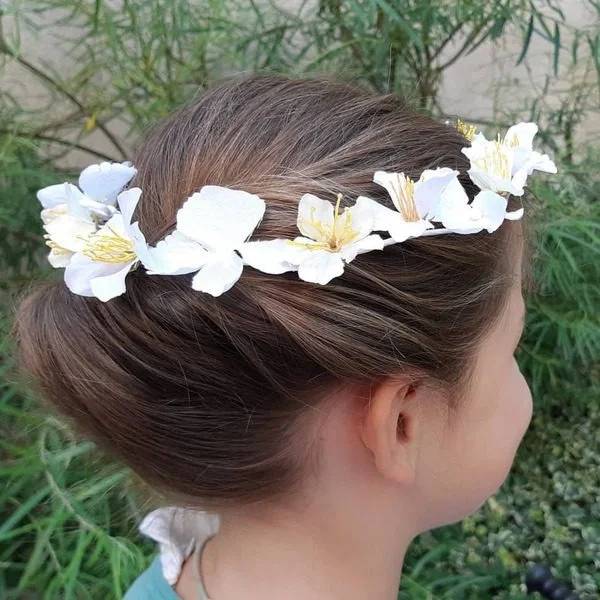 Crown Flower Hidden Bun - a girl is wearing blue shirt.