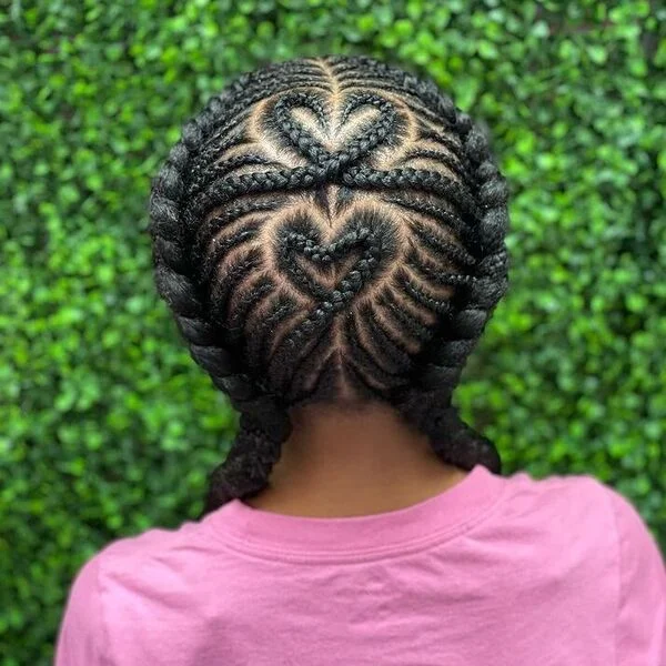 Fishbone Pigtails with Two Hearts - a woman wearing pink shirt.