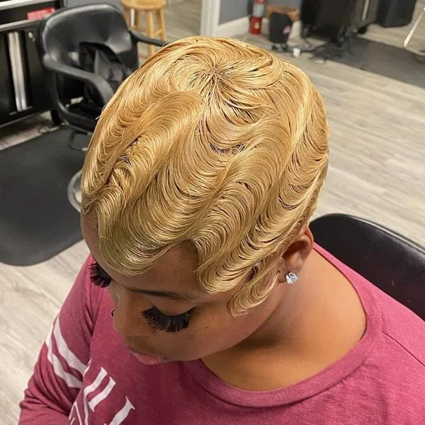 Full Quick Weave with Wet Waves - a woman wearing pale red shirt.