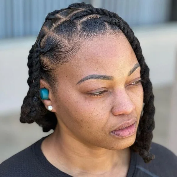 Jumbo Bob Twisted Dreads - a woman wearing black shirt.