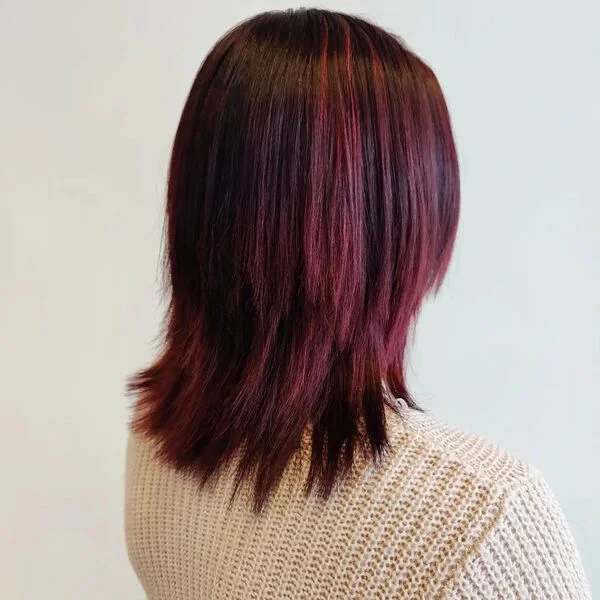 Layer Straight Burgundy Hair - a woman wearing crochet sweater.