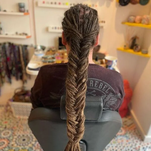 Long Dreadlocks Fishbone Braid - a woman wearing maroon shirt.