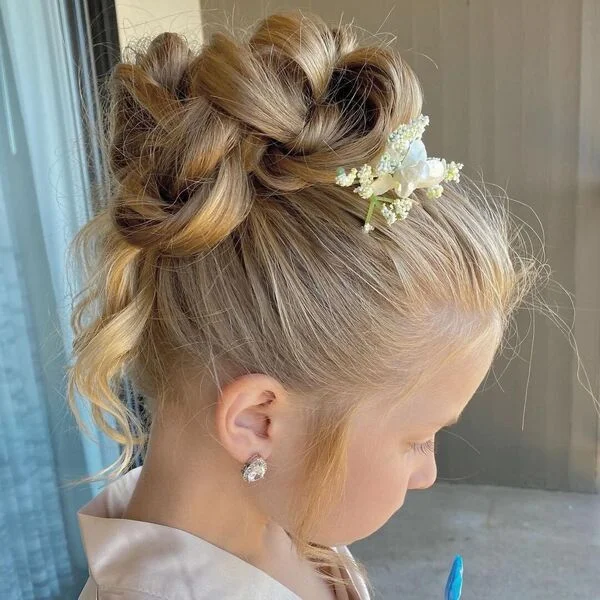 Messy High Bun Hairstyle - a girl is wearing peach silk robe.