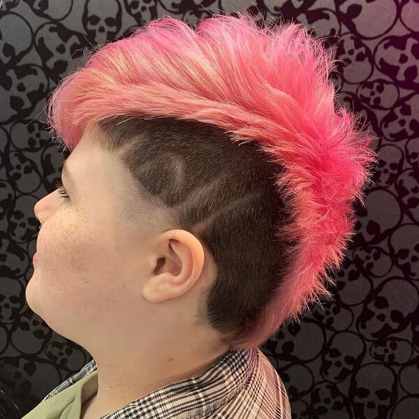 Pink Blended Mohawk with Dark Tone Sides - a woman wearing plaid polo.