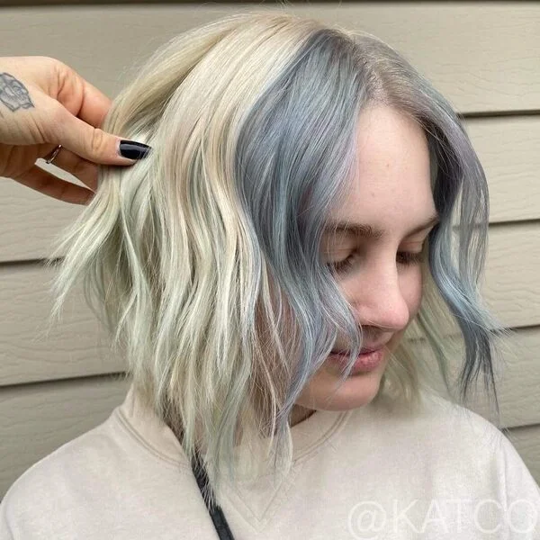 Platinum White with Pastel Blue Tints - a woman wearing nude sweater.