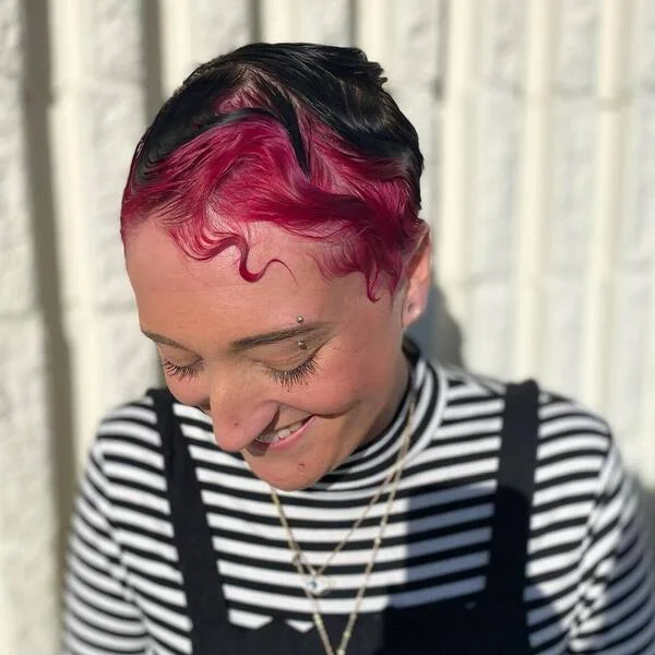 Retro Pixie Finger Waves - a woman wearing stripe top with overlay black jumper.