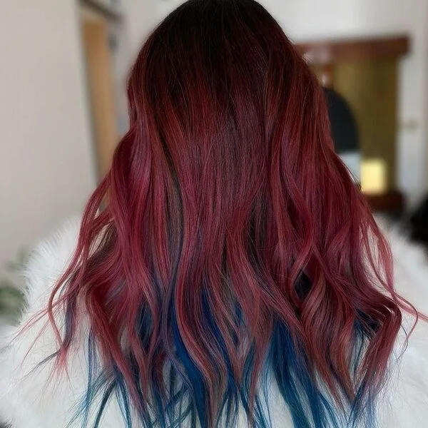 Shag Burgundy with Blue Peekaboo - a woman wearing white feather coat.