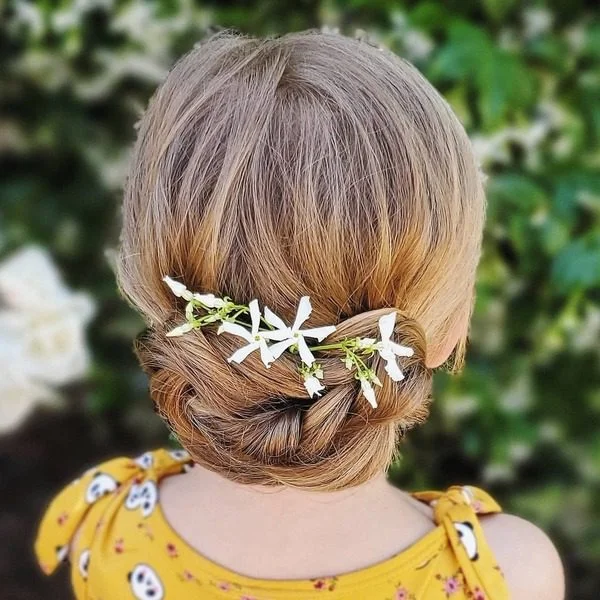 Twisted Easy Low Bun - a girl is wearing yellow panda top.