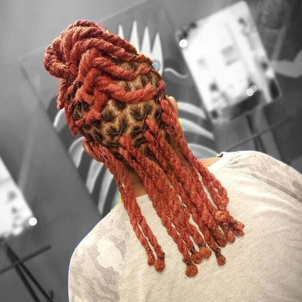 two strand orange dreadlocks - vibrant orange locs twisted in two-strand technique