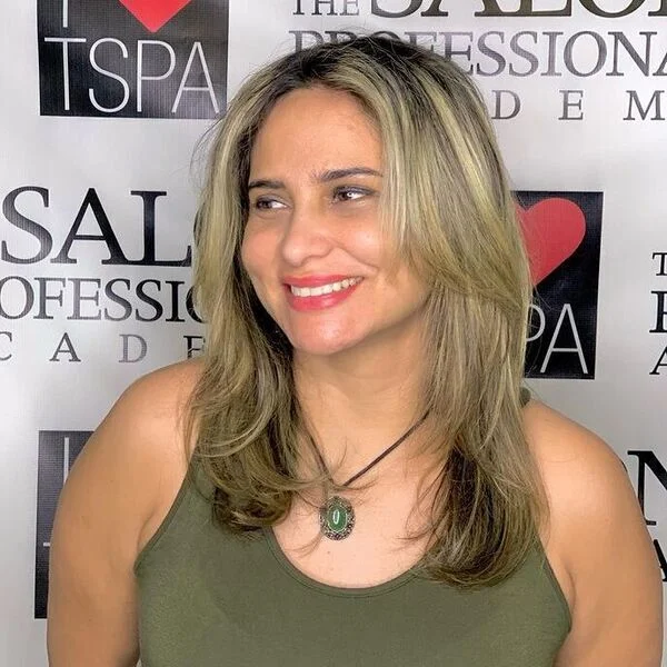 a woman wearing green tank top