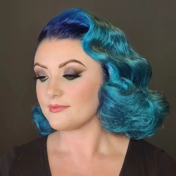 Vintage Finger Waves Bob - a woman wearing full glam make-up in black shirt.