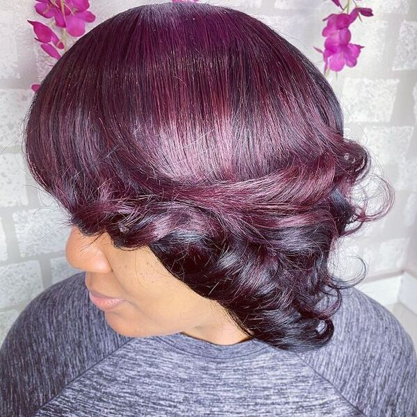 Wine Side part Curl Pixie - a woman wearing gray shirt.
