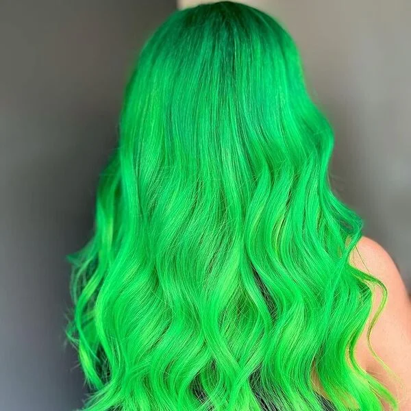 A woman wearing black tank top