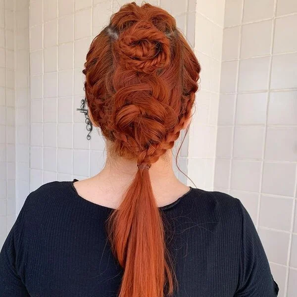A woman wearing knitted black top - Viking Hairstyles Women