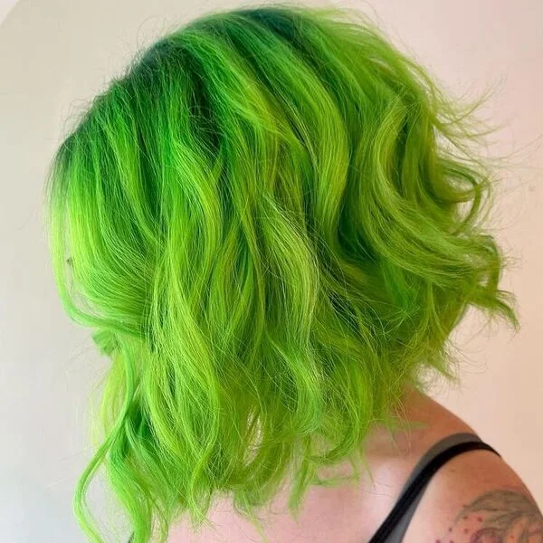 Electric Green Messy Lob - a woman wearing black top