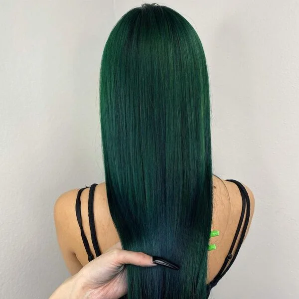 A woman wearing black tank top