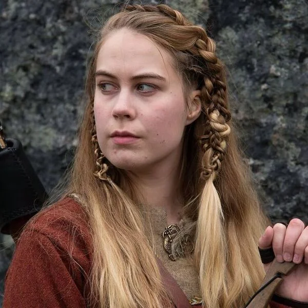 Frontal Twisted Braid Style - a woman wearing red suit