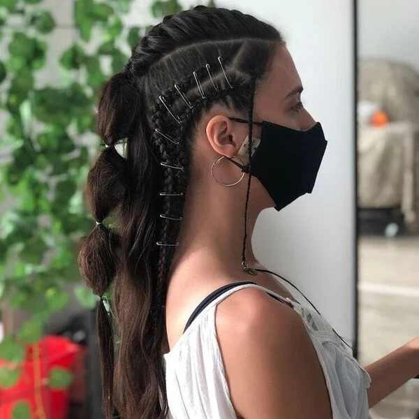 Pin Up Bubble Braid Viking Hairstyle - A woman wearing white tank top with mask