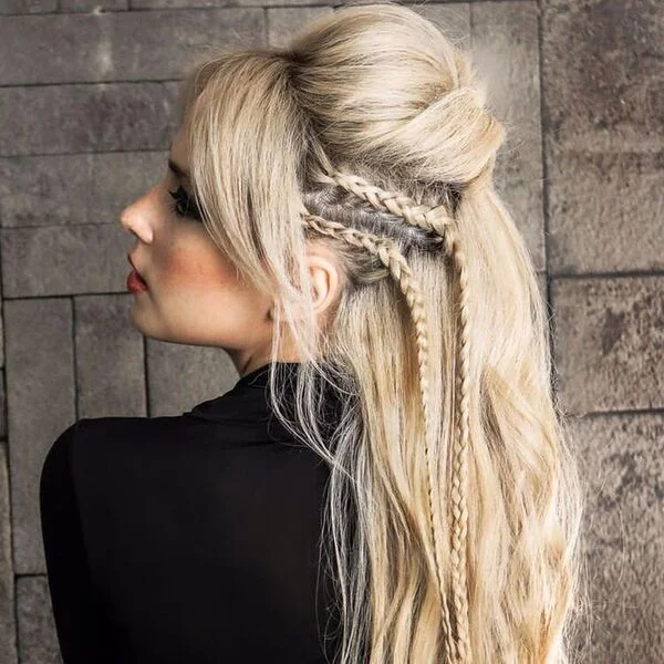 A woman wearing jacket - Viking Hairstyles Women