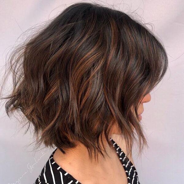 Sexy Little Lob with Highlights - a woman wearing stripes - short sassy haircuts