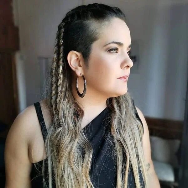 Shave Side Long Hair Braids - a woman wearing one sided top