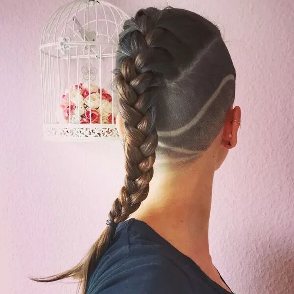 A woman wearing V neck shirt - Viking Hairstyles Women