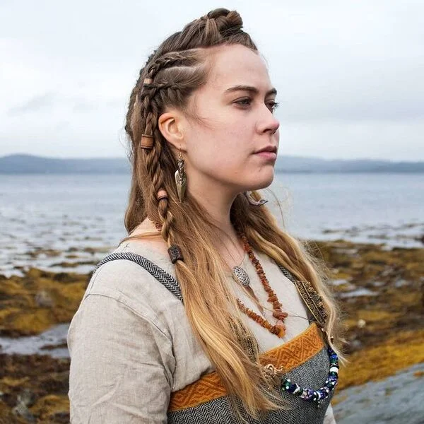 Vintage Viking Hairstyles - A woman wearing viking outfit