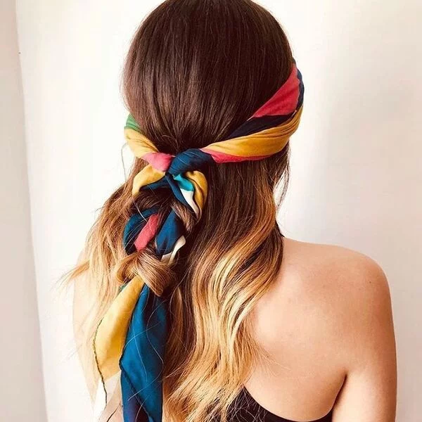 a woman wearing black razor back top