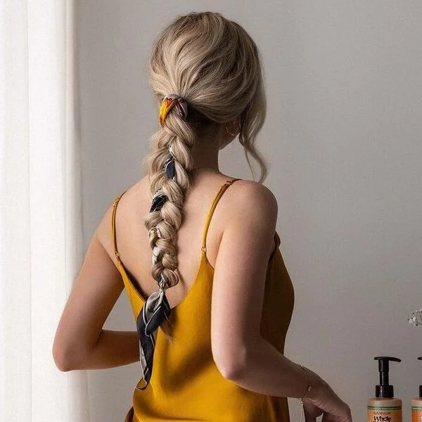 A woman wearing yellow dress