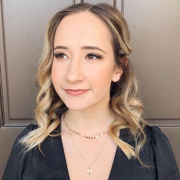a woman wearing black puff dress