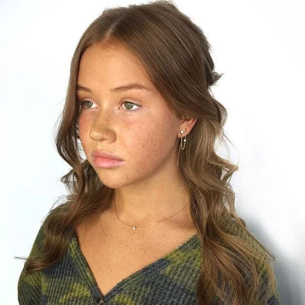 a woman wearing green shade cardigan
