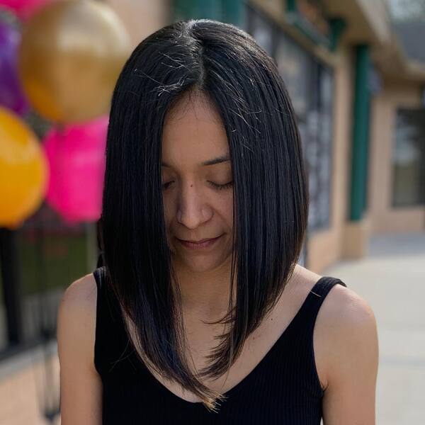a woman wearing black tank top